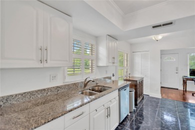 This magnificent 2-bedroom,2-bathroom villa, complete with a on Highland Lakes Executive Golf Course in Florida - for sale on GolfHomes.com, golf home, golf lot