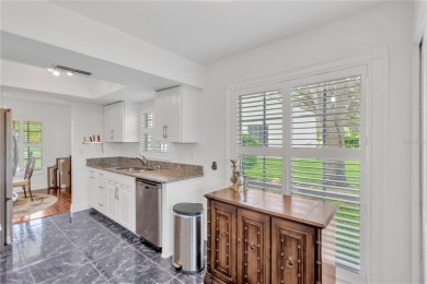 This magnificent 2-bedroom,2-bathroom villa, complete with a on Highland Lakes Executive Golf Course in Florida - for sale on GolfHomes.com, golf home, golf lot