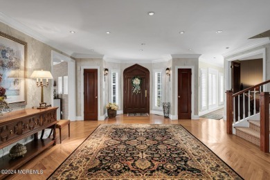 This stunning 5-bedroom, 5.5-bathroom English Tudor waterfront on Navesink Country Club in New Jersey - for sale on GolfHomes.com, golf home, golf lot