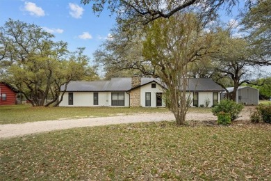 Embrace the tranquility of country living in this beautifully on Lake Whitney Country Club in Texas - for sale on GolfHomes.com, golf home, golf lot