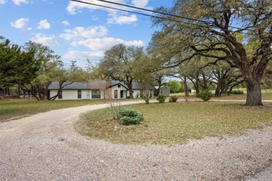 Embrace the tranquility of country living in this beautifully on Lake Whitney Country Club in Texas - for sale on GolfHomes.com, golf home, golf lot