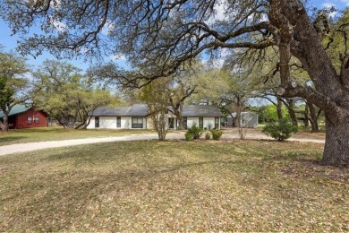 Embrace the tranquility of country living in this beautifully on Lake Whitney Country Club in Texas - for sale on GolfHomes.com, golf home, golf lot