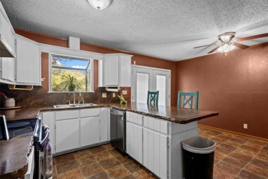 Embrace the tranquility of country living in this beautifully on Lake Whitney Country Club in Texas - for sale on GolfHomes.com, golf home, golf lot