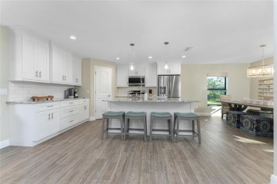 Turnkey furnished and income-producing, this beautifully on Rotonda Golf and Country Club The Palms Course in Florida - for sale on GolfHomes.com, golf home, golf lot