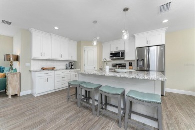 Turnkey furnished and income-producing, this beautifully on Rotonda Golf and Country Club The Palms Course in Florida - for sale on GolfHomes.com, golf home, golf lot