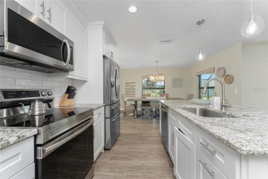 Turnkey furnished and income-producing, this beautifully on Rotonda Golf and Country Club The Palms Course in Florida - for sale on GolfHomes.com, golf home, golf lot