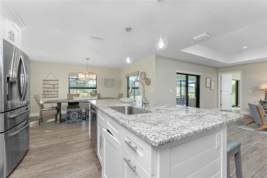 Turnkey furnished and income-producing, this beautifully on Rotonda Golf and Country Club The Palms Course in Florida - for sale on GolfHomes.com, golf home, golf lot