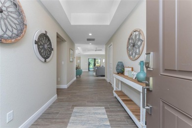 Turnkey furnished and income-producing, this beautifully on Rotonda Golf and Country Club The Palms Course in Florida - for sale on GolfHomes.com, golf home, golf lot