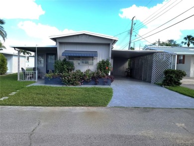 Welcome home!!  This adorably 2 bed, 1.5 bath home is the on Heather Hills Golf Course in Florida - for sale on GolfHomes.com, golf home, golf lot