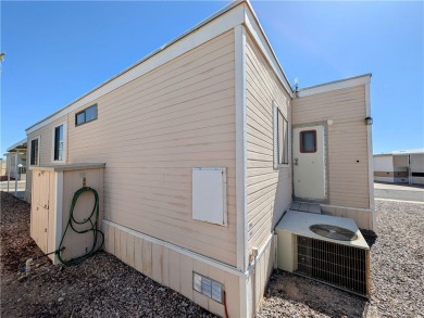 Lovely, oversized corner lot with a fabulous, covered patio and on Riverview Golf Course in Arizona - for sale on GolfHomes.com, golf home, golf lot