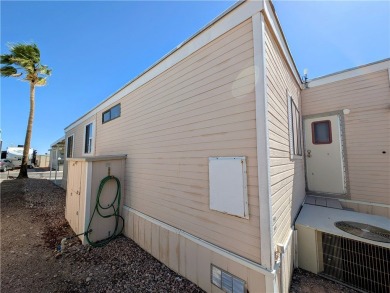 Lovely, oversized corner lot with a fabulous, covered patio and on Riverview Golf Course in Arizona - for sale on GolfHomes.com, golf home, golf lot