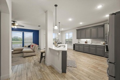 Get your tees and clubs ready! This 4 bedroom, 2.5 bath move in on Stone River Golf Club in Texas - for sale on GolfHomes.com, golf home, golf lot
