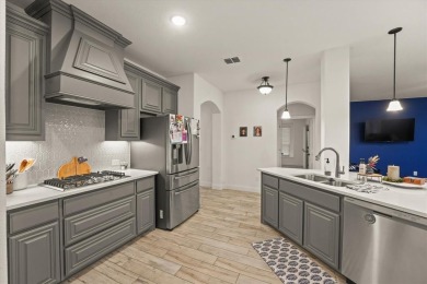Get your tees and clubs ready! This 4 bedroom, 2.5 bath move in on Stone River Golf Club in Texas - for sale on GolfHomes.com, golf home, golf lot
