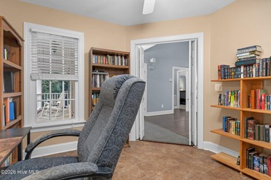 Set along the 13th green in The River subdivision of Lake Royale on River Golf and Country Club at Lake Royale in North Carolina - for sale on GolfHomes.com, golf home, golf lot