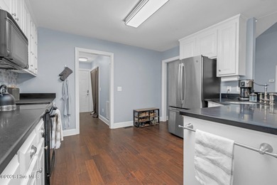 Set along the 13th green in The River subdivision of Lake Royale on River Golf and Country Club at Lake Royale in North Carolina - for sale on GolfHomes.com, golf home, golf lot