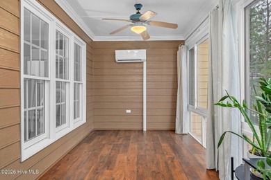 Set along the 13th green in The River subdivision of Lake Royale on River Golf and Country Club at Lake Royale in North Carolina - for sale on GolfHomes.com, golf home, golf lot