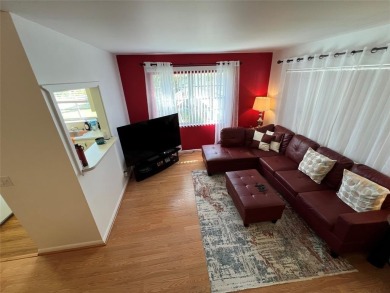 Come see it now! Corner 2nd floor 1 br/1.5 bth with CENTRAL A/C on Hillsboro Pines Golf in Florida - for sale on GolfHomes.com, golf home, golf lot