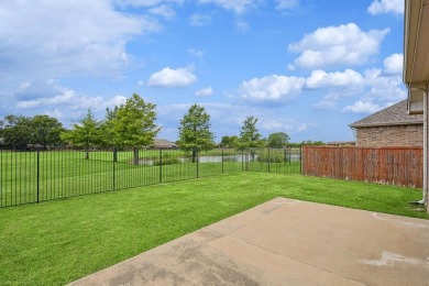 Discover this fantastic home on the 15th green of the WaterView on Jim Boggs in Texas - for sale on GolfHomes.com, golf home, golf lot