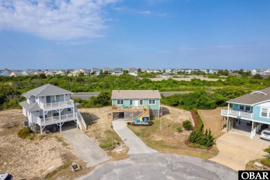 Welcome to your charming beach retreat in Nags Head, NC! This on Nags Head Golf Links in North Carolina - for sale on GolfHomes.com, golf home, golf lot