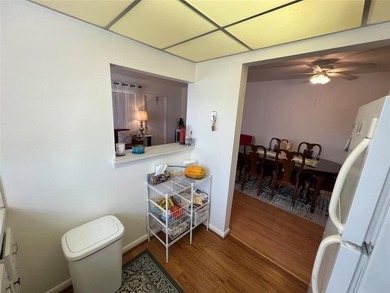 Come see it now! Corner 2nd floor 1 br/1.5 bth with CENTRAL A/C on Hillsboro Pines Golf in Florida - for sale on GolfHomes.com, golf home, golf lot