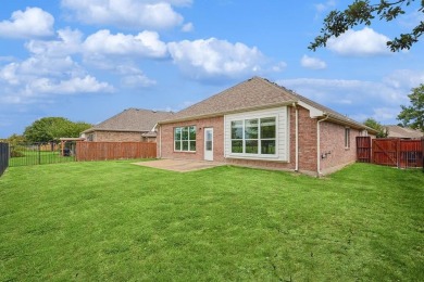 Discover this fantastic home on the 15th green of the WaterView on Jim Boggs in Texas - for sale on GolfHomes.com, golf home, golf lot