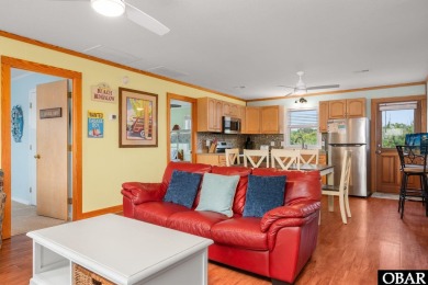 Welcome to your charming beach retreat in Nags Head, NC! This on Nags Head Golf Links in North Carolina - for sale on GolfHomes.com, golf home, golf lot