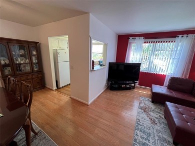 Come see it now! Corner 2nd floor 1 br/1.5 bth with CENTRAL A/C on Hillsboro Pines Golf in Florida - for sale on GolfHomes.com, golf home, golf lot