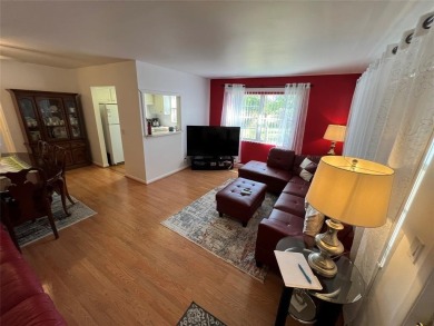 Come see it now! Corner 2nd floor 1 br/1.5 bth with CENTRAL A/C on Hillsboro Pines Golf in Florida - for sale on GolfHomes.com, golf home, golf lot