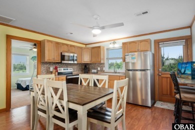 Welcome to your charming beach retreat in Nags Head, NC! This on Nags Head Golf Links in North Carolina - for sale on GolfHomes.com, golf home, golf lot