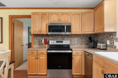 Welcome to your charming beach retreat in Nags Head, NC! This on Nags Head Golf Links in North Carolina - for sale on GolfHomes.com, golf home, golf lot