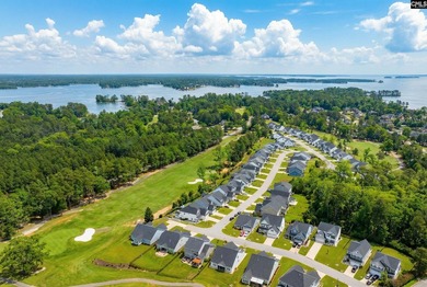 Drive your golf cart to the lake from this beautiful 3Br, 2 1/2 on Timberlake Country Club in South Carolina - for sale on GolfHomes.com, golf home, golf lot