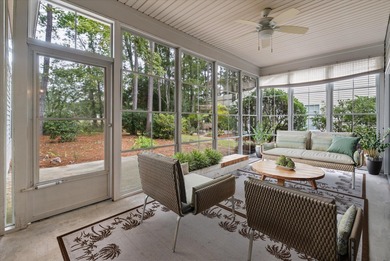 THIS PERFECT GOLF COURSE HOME is framed by majestic trees that on Legend Oaks Plantation Golf Club in South Carolina - for sale on GolfHomes.com, golf home, golf lot