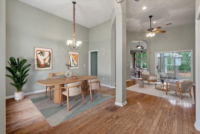 THIS PERFECT GOLF COURSE HOME is framed by majestic trees that on Legend Oaks Plantation Golf Club in South Carolina - for sale on GolfHomes.com, golf home, golf lot