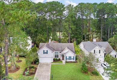 THIS PERFECT GOLF COURSE HOME is framed by majestic trees that on Legend Oaks Plantation Golf Club in South Carolina - for sale on GolfHomes.com, golf home, golf lot