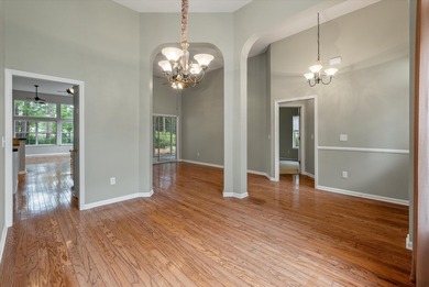 THIS PERFECT GOLF COURSE HOME is framed by majestic trees that on Legend Oaks Plantation Golf Club in South Carolina - for sale on GolfHomes.com, golf home, golf lot