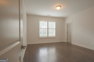 Enjoy the perfect balance of comfort and connection in this on Lanier Island Legacy Golf Couorse in Georgia - for sale on GolfHomes.com, golf home, golf lot