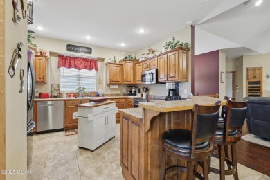 Welcome to 702 Copper Oaks Drive, a stunning 4-bedroom, 3-bath on Briarbrook Golf Course in Missouri - for sale on GolfHomes.com, golf home, golf lot