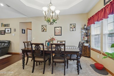 Welcome to 702 Copper Oaks Drive, a stunning 4-bedroom, 3-bath on Briarbrook Golf Course in Missouri - for sale on GolfHomes.com, golf home, golf lot