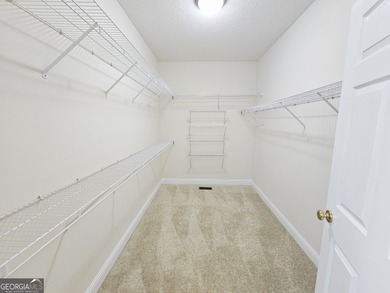 Welcome home to this beautifully maintained townhome nestled on on Barrington Hall Golf Course in Georgia - for sale on GolfHomes.com, golf home, golf lot