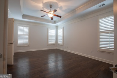 Enjoy the perfect balance of comfort and connection in this on Lanier Island Legacy Golf Couorse in Georgia - for sale on GolfHomes.com, golf home, golf lot