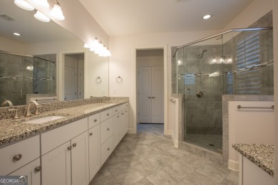 Enjoy the perfect balance of comfort and connection in this on Lanier Island Legacy Golf Couorse in Georgia - for sale on GolfHomes.com, golf home, golf lot