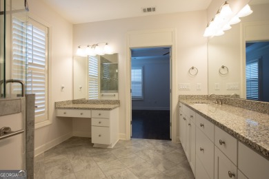 Enjoy the perfect balance of comfort and connection in this on Lanier Island Legacy Golf Couorse in Georgia - for sale on GolfHomes.com, golf home, golf lot