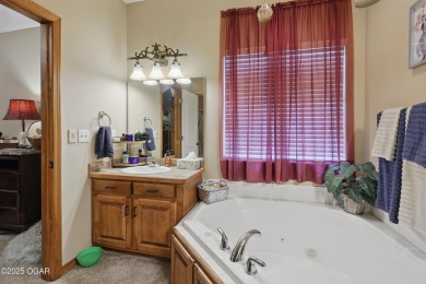 Welcome to 702 Copper Oaks Drive, a stunning 4-bedroom, 3-bath on Briarbrook Golf Course in Missouri - for sale on GolfHomes.com, golf home, golf lot