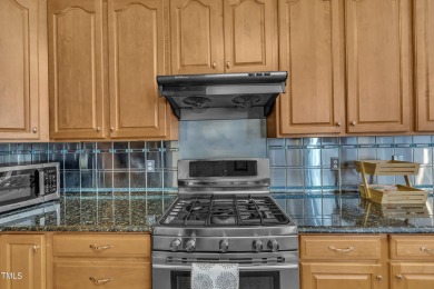 This stately, brick front home in popular Brier Creek golf on Brier Creek Country Club in North Carolina - for sale on GolfHomes.com, golf home, golf lot