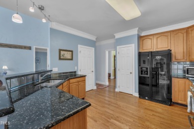 This stately, brick front home in popular Brier Creek golf on Brier Creek Country Club in North Carolina - for sale on GolfHomes.com, golf home, golf lot