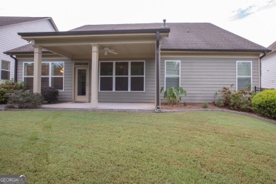 Enjoy the perfect balance of comfort and connection in this on Lanier Island Legacy Golf Couorse in Georgia - for sale on GolfHomes.com, golf home, golf lot