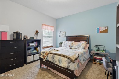 Welcome to 702 Copper Oaks Drive, a stunning 4-bedroom, 3-bath on Briarbrook Golf Course in Missouri - for sale on GolfHomes.com, golf home, golf lot