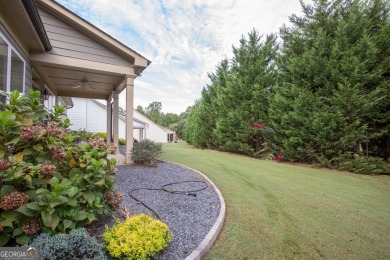 Enjoy the perfect balance of comfort and connection in this on Lanier Island Legacy Golf Couorse in Georgia - for sale on GolfHomes.com, golf home, golf lot