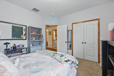 Welcome to 702 Copper Oaks Drive, a stunning 4-bedroom, 3-bath on Briarbrook Golf Course in Missouri - for sale on GolfHomes.com, golf home, golf lot