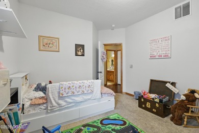 Welcome to 702 Copper Oaks Drive, a stunning 4-bedroom, 3-bath on Briarbrook Golf Course in Missouri - for sale on GolfHomes.com, golf home, golf lot